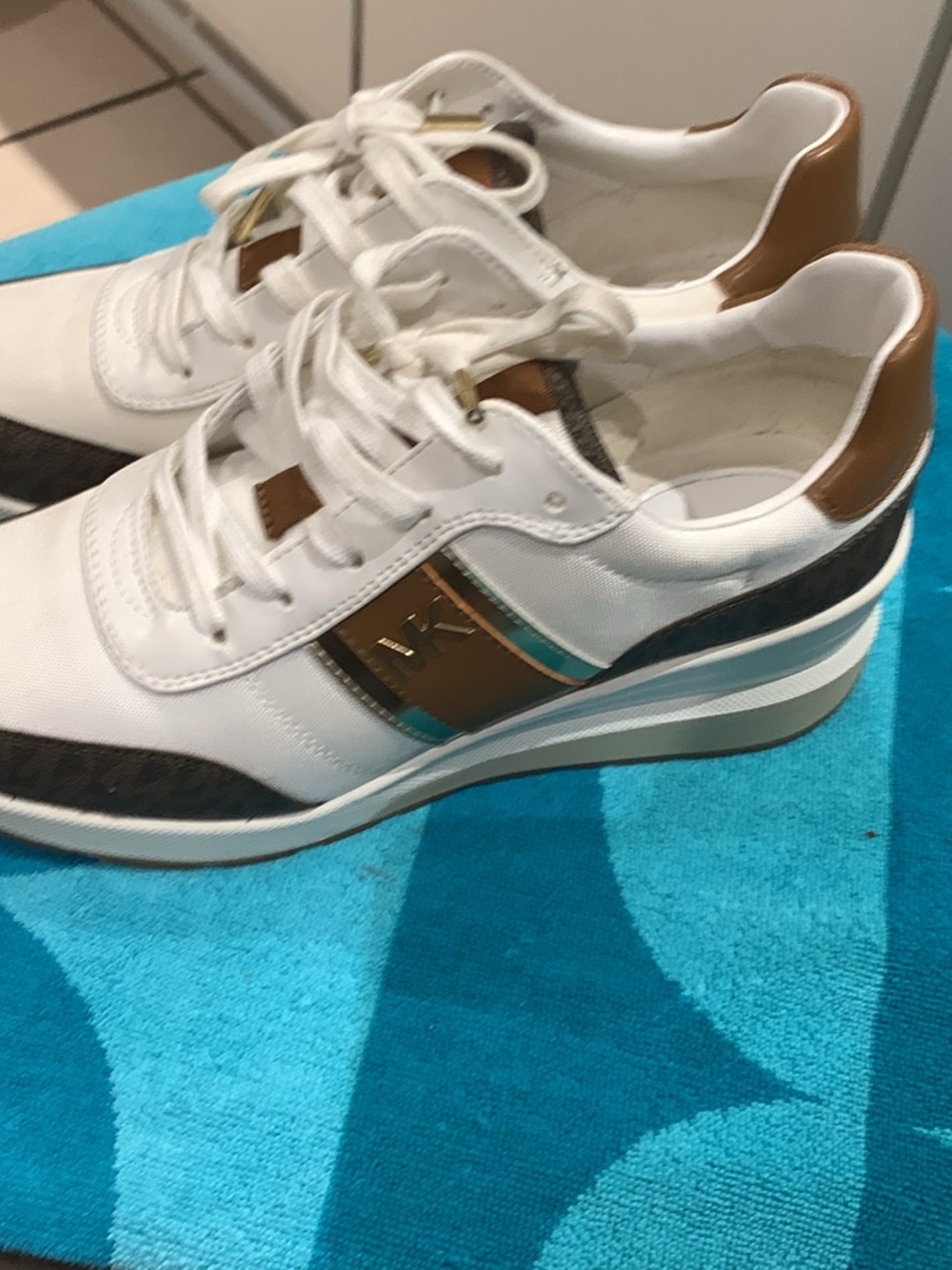 Michael Kors White Sneakers with Brown and Gold Accents and Dark Logo Trim